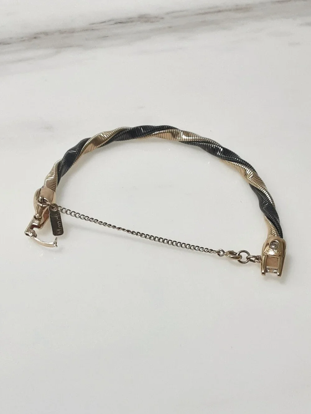 MONET Two-Tone Twisted Black and Gold Cable Bracelet with Safety Chain 7